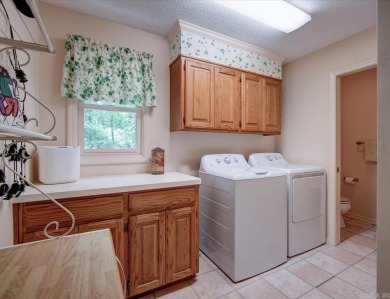 CHARMING VILLAGE RETREAT!  This cozy 3 bed, 2.5 bath home has a on Coronado Golf Course in Arkansas - for sale on GolfHomes.com, golf home, golf lot
