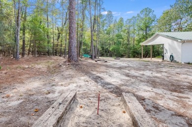 Nestled amidst the serene East Texas piney woods, this on Rayburn Country Club in Texas - for sale on GolfHomes.com, golf home, golf lot