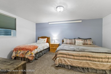 Discover mountain living at its finest with this stunning home on Star Valley RV Golf Course in Wyoming - for sale on GolfHomes.com, golf home, golf lot