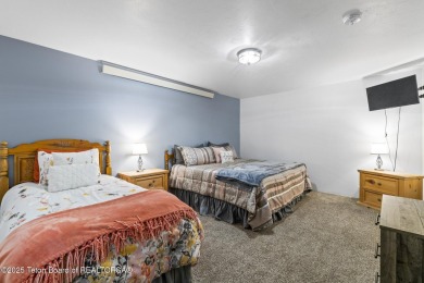 Discover mountain living at its finest with this stunning home on Star Valley RV Golf Course in Wyoming - for sale on GolfHomes.com, golf home, golf lot
