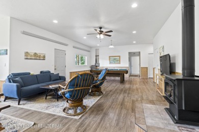 Discover mountain living at its finest with this stunning home on Star Valley RV Golf Course in Wyoming - for sale on GolfHomes.com, golf home, golf lot