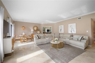 Experience the Ultimate in Tropical Living! Enjoy serene lake on Club at Pelican Bay Golf Course in Florida - for sale on GolfHomes.com, golf home, golf lot