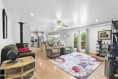 Discover mountain living at its finest with this stunning home on Star Valley RV Golf Course in Wyoming - for sale on GolfHomes.com, golf home, golf lot