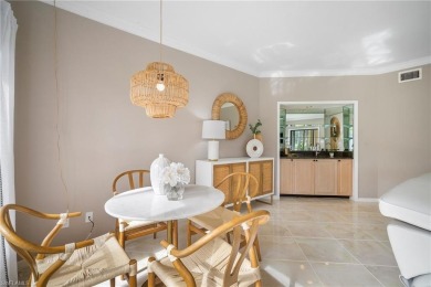 Experience the Ultimate in Tropical Living! Enjoy serene lake on Club at Pelican Bay Golf Course in Florida - for sale on GolfHomes.com, golf home, golf lot