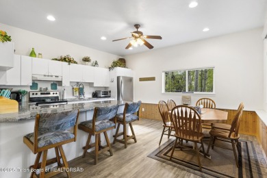 Discover mountain living at its finest with this stunning home on Star Valley RV Golf Course in Wyoming - for sale on GolfHomes.com, golf home, golf lot