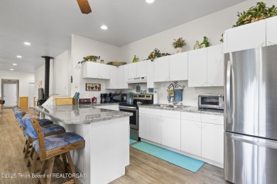 Discover mountain living at its finest with this stunning home on Star Valley RV Golf Course in Wyoming - for sale on GolfHomes.com, golf home, golf lot