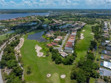 NEW ROOF! This spacious home with updated, kitchen and bathrooms on Santa Lucia River Club in Florida - for sale on GolfHomes.com, golf home, golf lot