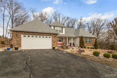 Beautiful home in highly desirable Raintree Plantation Golf and on Raintree Country Club in Missouri - for sale on GolfHomes.com, golf home, golf lot