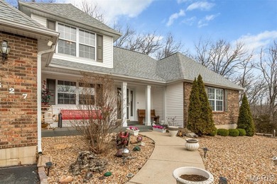 Beautiful home in highly desirable Raintree Plantation Golf and on Raintree Country Club in Missouri - for sale on GolfHomes.com, golf home, golf lot