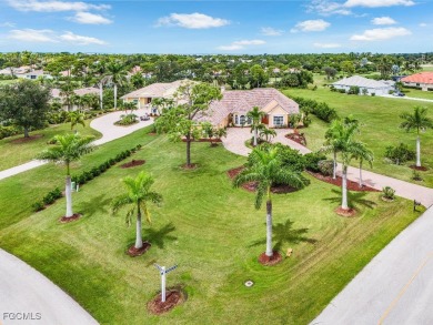Fabulous estate home on golf course in Burnt Store Marina on Burnt Store Golf Club in Florida - for sale on GolfHomes.com, golf home, golf lot