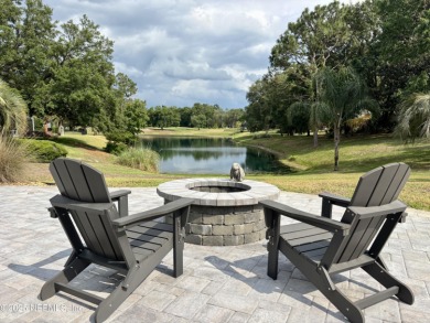 Experience luxury & tranquility in this stunning single-story on Magnolia Point Golf and Country Club in Florida - for sale on GolfHomes.com, golf home, golf lot