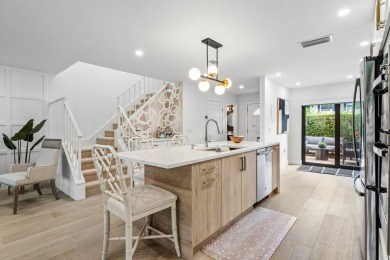 This contemporary townhouse, updated in 2022, effortlessly on Hunters Run Golf and Country Club in Florida - for sale on GolfHomes.com, golf home, golf lot