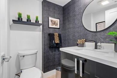 This contemporary townhouse, updated in 2022, effortlessly on Hunters Run Golf and Country Club in Florida - for sale on GolfHomes.com, golf home, golf lot