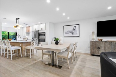 This contemporary townhouse, updated in 2022, effortlessly on Hunters Run Golf and Country Club in Florida - for sale on GolfHomes.com, golf home, golf lot