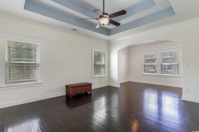 Step into luxury and comfort with this stunning executive-style on Wild Wing Plantation in South Carolina - for sale on GolfHomes.com, golf home, golf lot