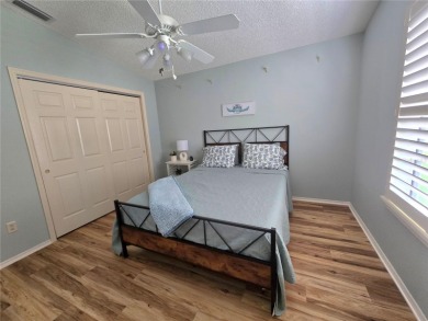 Fantastic location for this Villa in The Villages -- just on The Links of Spruce Creek in Florida - for sale on GolfHomes.com, golf home, golf lot