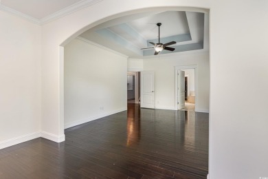 Step into luxury and comfort with this stunning executive-style on Wild Wing Plantation in South Carolina - for sale on GolfHomes.com, golf home, golf lot
