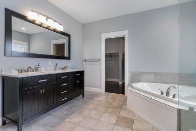 Step into luxury and comfort with this stunning executive-style on Wild Wing Plantation in South Carolina - for sale on GolfHomes.com, golf home, golf lot