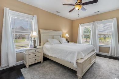 Step into luxury and comfort with this stunning executive-style on Wild Wing Plantation in South Carolina - for sale on GolfHomes.com, golf home, golf lot