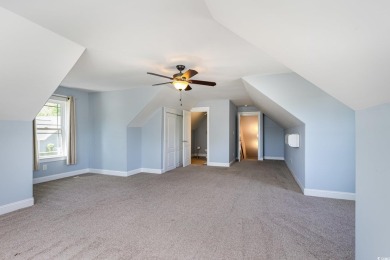 Step into luxury and comfort with this stunning executive-style on Wild Wing Plantation in South Carolina - for sale on GolfHomes.com, golf home, golf lot