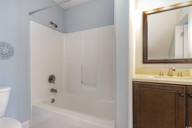 Step into luxury and comfort with this stunning executive-style on Wild Wing Plantation in South Carolina - for sale on GolfHomes.com, golf home, golf lot