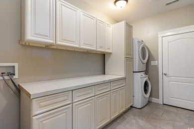 Step into luxury and comfort with this stunning executive-style on Wild Wing Plantation in South Carolina - for sale on GolfHomes.com, golf home, golf lot