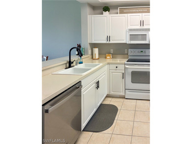 Impeccably maintained Turn-Key  2-bedroom, 2-bath first-floor on  in Florida - for sale on GolfHomes.com, golf home, golf lot