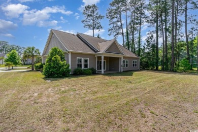 Step into luxury and comfort with this stunning executive-style on Wild Wing Plantation in South Carolina - for sale on GolfHomes.com, golf home, golf lot