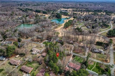 Build your dream home on this beautiful half-acre lot in the on Forest Oaks Country Club in North Carolina - for sale on GolfHomes.com, golf home, golf lot