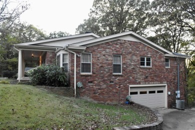 This elegant home in Stonebrook overlooks the Helena Country on Helena Country Club in Arkansas - for sale on GolfHomes.com, golf home, golf lot