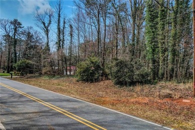 Build your dream home on this beautiful half-acre lot in the on Forest Oaks Country Club in North Carolina - for sale on GolfHomes.com, golf home, golf lot