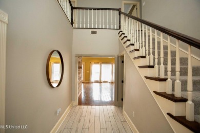 Welcome to 132 Pine Ridge Circle--an exceptional two-story home on Bay Pointe Golf and Resort in Mississippi - for sale on GolfHomes.com, golf home, golf lot