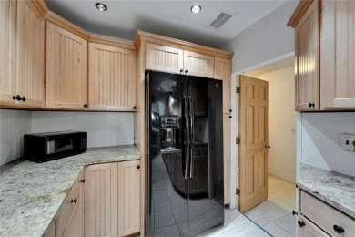 This beautifully well maintained 3 bedroom 2 bathroom home is on North Lakes Golf Course in Florida - for sale on GolfHomes.com, golf home, golf lot