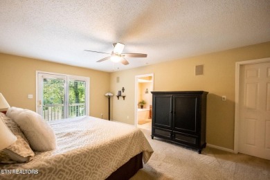 This lovely lakefront home located in a quiet cove, is nestled on Toqua Golf Course - Loudon County in Tennessee - for sale on GolfHomes.com, golf home, golf lot