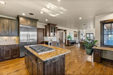 This Sun Forest-built home is perfectly positioned between the on The Club At Pronghorn Golf Course in Oregon - for sale on GolfHomes.com, golf home, golf lot