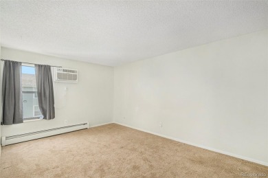 Welcome to this bright and inviting third-floor condo, in a on Emerald Greens Golf Club in Colorado - for sale on GolfHomes.com, golf home, golf lot