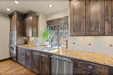 This Sun Forest-built home is perfectly positioned between the on The Club At Pronghorn Golf Course in Oregon - for sale on GolfHomes.com, golf home, golf lot