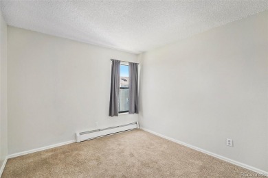 Welcome to this bright and inviting third-floor condo, in a on Emerald Greens Golf Club in Colorado - for sale on GolfHomes.com, golf home, golf lot