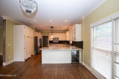 Welcome to 132 Pine Ridge Circle--an exceptional two-story home on Bay Pointe Golf and Resort in Mississippi - for sale on GolfHomes.com, golf home, golf lot