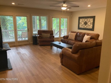 This lovely lakefront home located in a quiet cove, is nestled on Toqua Golf Course - Loudon County in Tennessee - for sale on GolfHomes.com, golf home, golf lot