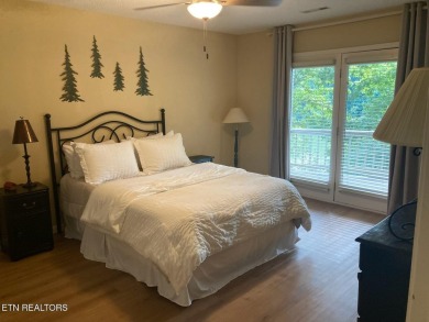 This lovely lakefront home located in a quiet cove, is nestled on Toqua Golf Course - Loudon County in Tennessee - for sale on GolfHomes.com, golf home, golf lot