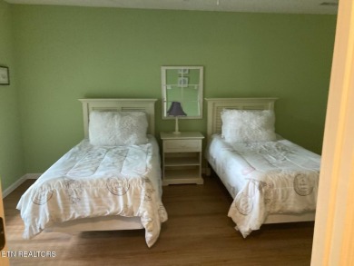 This lovely lakefront home located in a quiet cove, is nestled on Toqua Golf Course - Loudon County in Tennessee - for sale on GolfHomes.com, golf home, golf lot