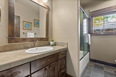 This Sun Forest-built home is perfectly positioned between the on The Club At Pronghorn Golf Course in Oregon - for sale on GolfHomes.com, golf home, golf lot