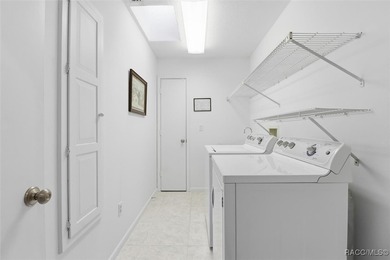 Sweet and solid Sugarmill home featuring a desirable split 2/2 on Sugarmill Woods Golf and Country Club in Florida - for sale on GolfHomes.com, golf home, golf lot