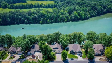 This lovely lakefront home located in a quiet cove, is nestled on Toqua Golf Course - Loudon County in Tennessee - for sale on GolfHomes.com, golf home, golf lot