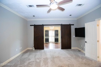 Welcome to 132 Pine Ridge Circle--an exceptional two-story home on Bay Pointe Golf and Resort in Mississippi - for sale on GolfHomes.com, golf home, golf lot