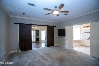 Welcome to 132 Pine Ridge Circle--an exceptional two-story home on Bay Pointe Golf and Resort in Mississippi - for sale on GolfHomes.com, golf home, golf lot
