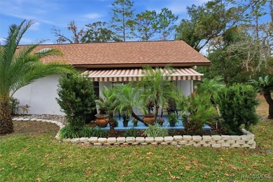 Sweet and solid Sugarmill home featuring a desirable split 2/2 on Sugarmill Woods Golf and Country Club in Florida - for sale on GolfHomes.com, golf home, golf lot