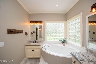Welcome to 132 Pine Ridge Circle--an exceptional two-story home on Bay Pointe Golf and Resort in Mississippi - for sale on GolfHomes.com, golf home, golf lot