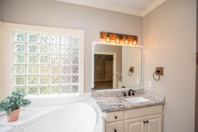Welcome to 132 Pine Ridge Circle--an exceptional two-story home on Bay Pointe Golf and Resort in Mississippi - for sale on GolfHomes.com, golf home, golf lot